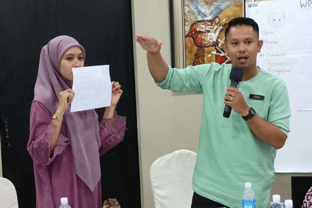 Two adults doing a presentation